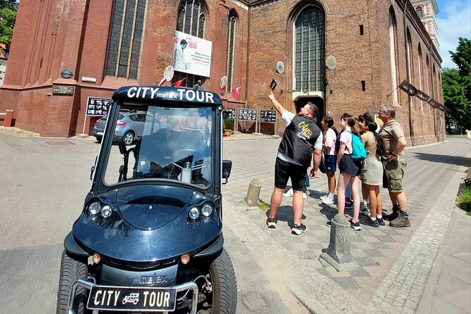 GDANSK City Tour by Golf Cart Live Guide & City Sightseeing 90min - Admiring the Golden Gate into Dluga Street