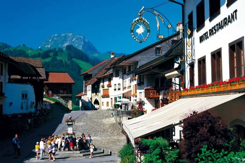 Geneva: Gruyères Tour with Chocolate, Cheese & Golden Train - Tasting and Dining at the Cheese Factory Restaurant