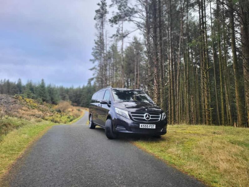 Giant's Causeway Private Tour by Five Star Luxury Transfers - Crossing the Carrick-a-Rede Rope Bridge