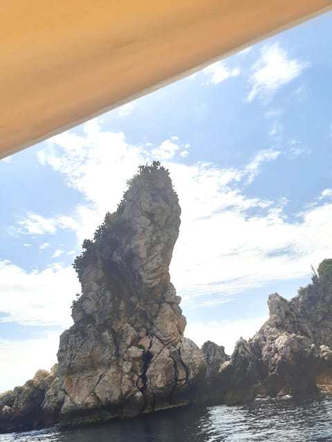 Giardini Naxos: Isola Bella and Grottos Cruise with Aperitif - Exploring Capotaormina and the Famous Hotel