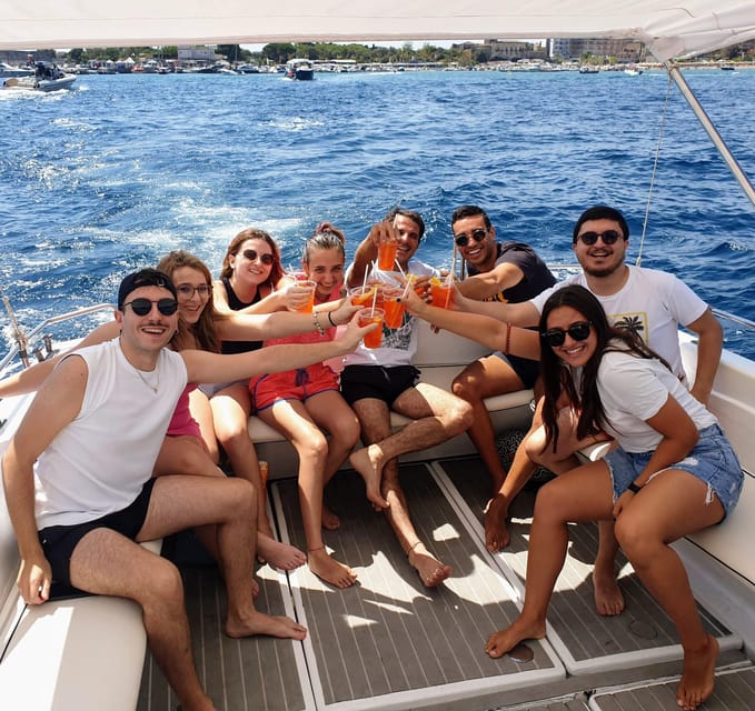 Giardini Naxos: Taormina & Isola Cruise Bella with Aperitif - Dolphins, Music, and the Search for Sea Caves