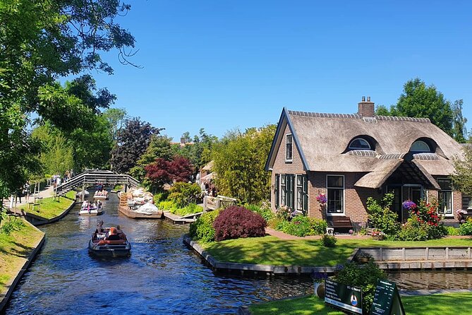 Giethoorn and Zaanse Schans Day Tour with Small Boat Ride - Key Points