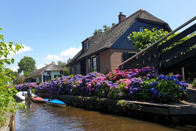 Giethoorn and Zaanse Schans Day Tour with Small Boat Ride - Starting Point and Overall Tour Structure