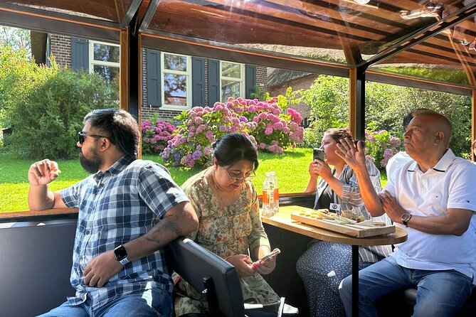 Giethoorn Roundtrip Transport with Optional Guided Canal Cruise - Unique Stops: Windmills and Village Highlights