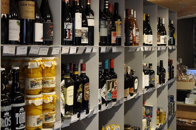 Girona Morning Food Tour & Local Market - Visiting Mercat del Lleo for Jamón Ibérico and Cava