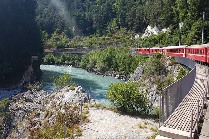 Glacier Express Panoramic Train Round Trip in one Day Private Tour from Luzern - The Glacier Express Panoramic Train Round Trip in One Day from Lucerne offers a comprehensive Swiss rail experience for those seeking breathtaking views and ease of logistics. Priced at $901.60 per person, this tour combines guided travel with the iconic Glacier Express route, perfect for travelers who want a seamless and informative day in the Swiss Alps. It lasts approximately 12 hours, making it a full-day adventure that covers some of Switzerlands most scenic regions. The tour includes a private Swiss guide, a prebooked seat on the Glacier Express, and a delicious 3-course lunch served at your seat, with vegetarian options available. While the tour is priced on the higher side, it appeals to those who appreciate comfort, expert guidance, and well-organized transportation, with the added convenience of avoiding complicated train bookings.