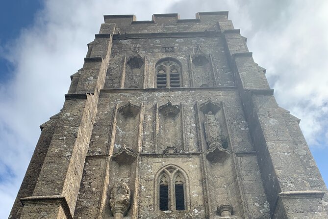 Glastonbury and Cheddar Gorge Guided Day Tour from London - Discovering Glastonbury Abbey’s Mystique
