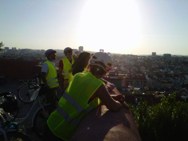 Go Lisbon by Night Electric Bike Tour - Riding an Electric Bike Through Lisbon’s Historic Streets