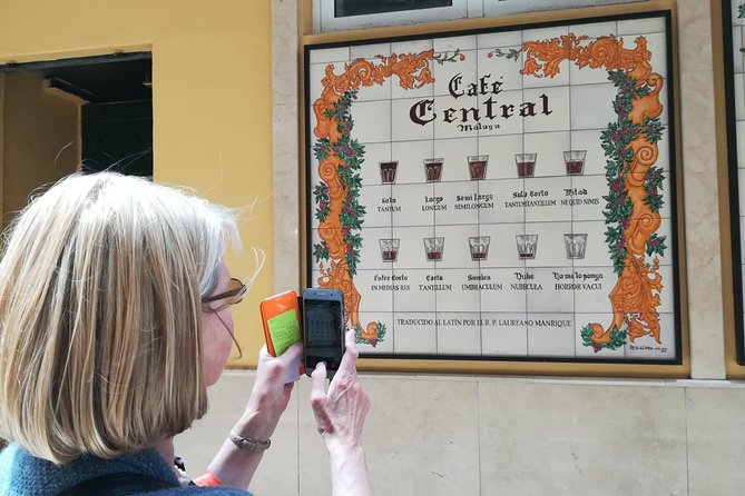 Go local for a day! - Secrets of La Calle Larios and Tasting Fried Almonds