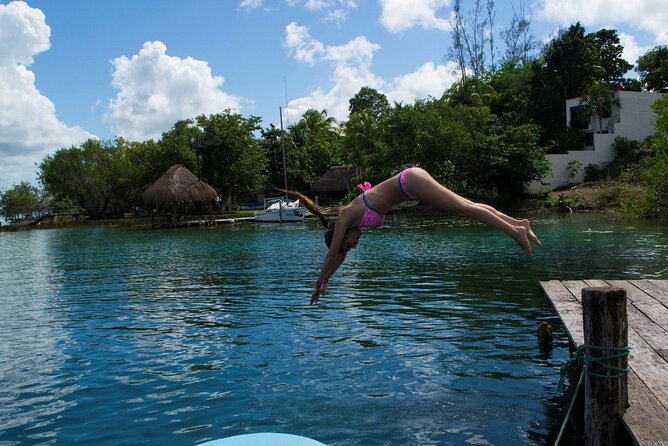 Gorgeous Tour in Pontoon Boat over Bacalar 7 Colors Lagoon from Cancún - Exploring Cenote Azul: Crystal-Clear Waters and Stunning Location