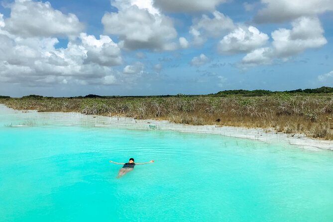 Gorgeous Tour in Pontoon Boat over Bacalar 7 Colors Lagoon from Cancún - Free Time at Cenote Cocalitos and Its Stromatolites
