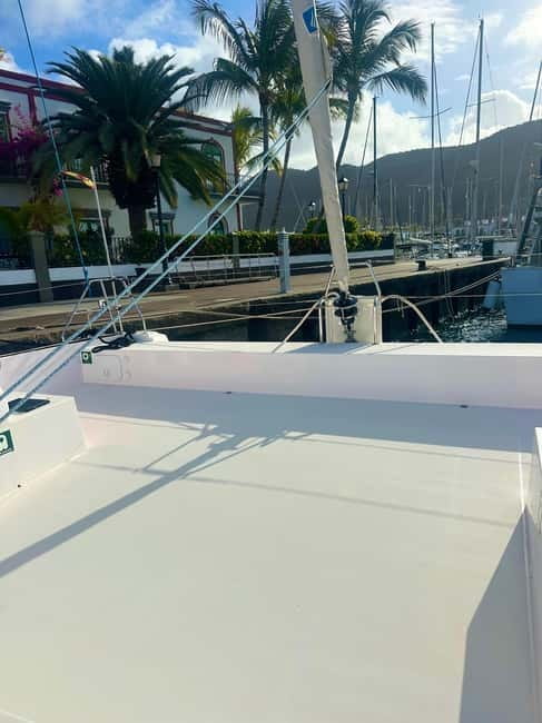 Gran Canaria: Catamaran Tour with Lunch on Pristine Beaches - Water Activities: Snorkeling, Paddleboarding, and Cave Exploration