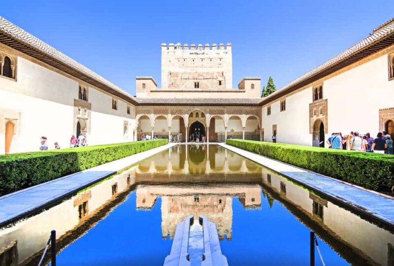 Granada: Alhambra, Nasrid Palaces & Gardens guided Tour - Exploring the Nasrid Palaces: Art, Architecture, and Symbols