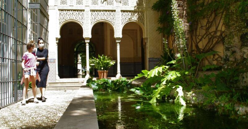 Granada: Gardens of Carmenes Guided Tour - Walking Through Albaicin’s Historic Streets