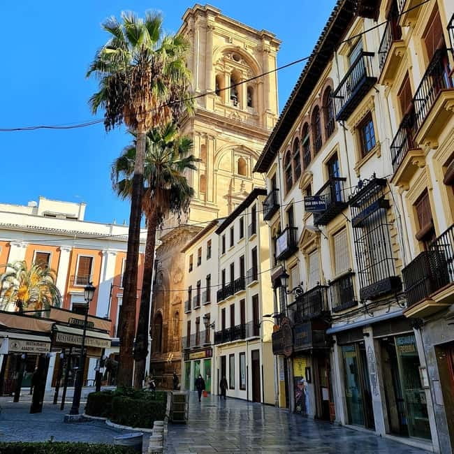 Granada: "Street Art & The Caves" Unique Guided Walking Tour - Entering a Historic Cave House in Sacromonte