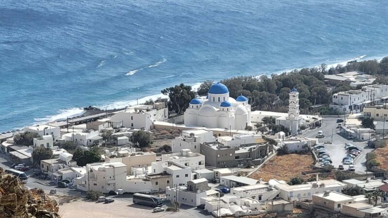 GreekAmerican guide Themistoklis to tour beautiful Santorini - Relaxing at Perissa’s Black Sand Beach