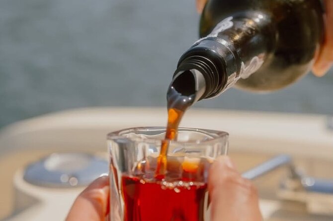 Guided boat tour with wine and sunset option. - Key Points