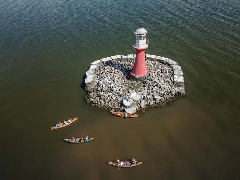 Guided Canoe Tour of the Curonian Spit Lithuania - Paddling Along the Shore and Visiting the Pervalka Lighthouse