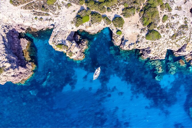 Guided day by boat in Carloforte with snorkelling and aperitif - Cala Fico: A Silent, Deep Inlet