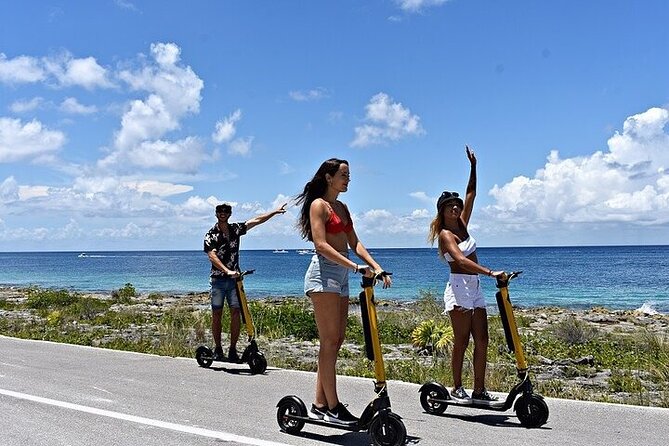 Guided Day Tour in Cozumel on a Clear Boat and Electric Scooter - Scenic Ride Along Avenida Rafael E. Melgar