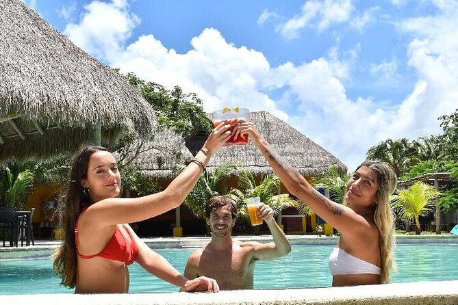 Guided Day Tour in Cozumel on a Clear Boat and Electric Scooter - Relaxing at Playa Uvas Beach Club