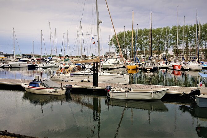 Guided Tour in an Old Convertible Car on the Côte de Nacre - Luc-sur-Mer: Charming Streets and Dike Views