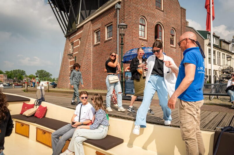 Haarlem: Guided Highlights Canal Cruise on Open Boat - Starting point at De Adriaan windmill, a historic landmark