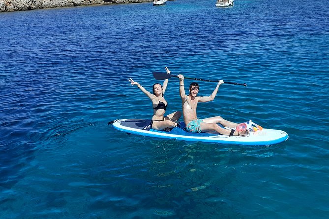 Half-Day Catamaran Trip in Menorca - Stops for Swimming, Snorkeling, and Relaxation
