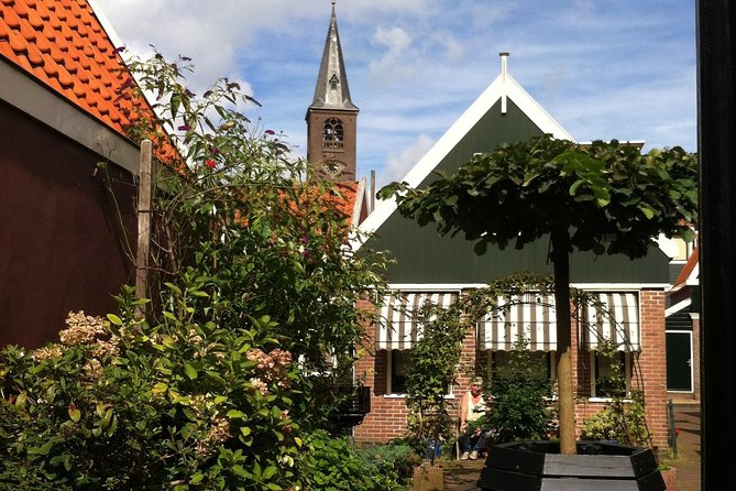 Half-Day Edam and Volendam Private Walking Tour from Amsterdam - Discovering Edam’s Historic Center and Iconic Sightseeing Spots