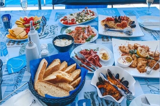 Half-Day Exclusive Catamaran Cruise in Santorini with Meal and Open Bar - Sunset Cruise: A Magical End to the Day