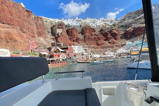Half Day Premium Catamaran Cruise in Santorini including Oia - The Intimate Experience with Small Group Size
