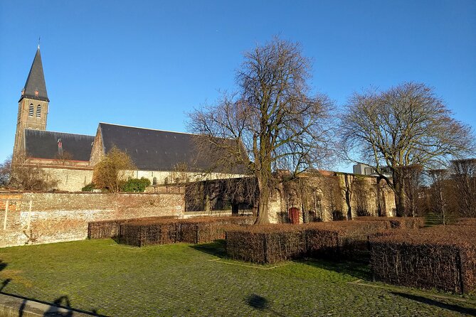 Half-Day Private Highlights and Hidden Gems of Ghent Tour - The Old Fish Mine Entrance at Korenlei