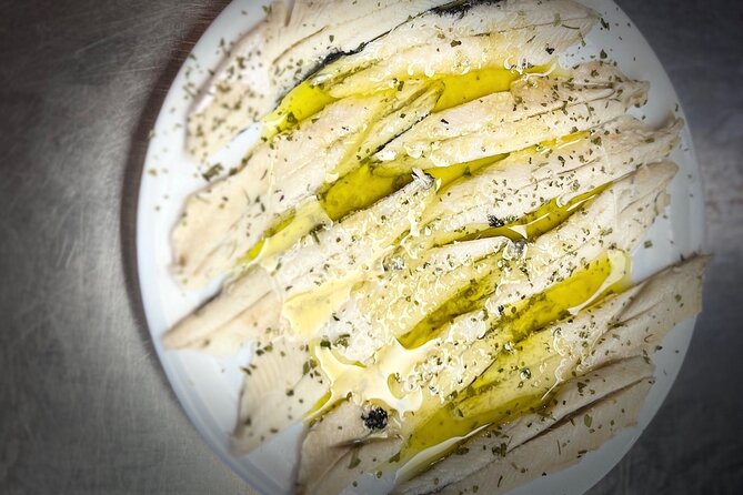 Half Day Private Madrid Tapas and History Walking Tour - Sampling Madrid Liquor and Spanish Cider in Historic Bars