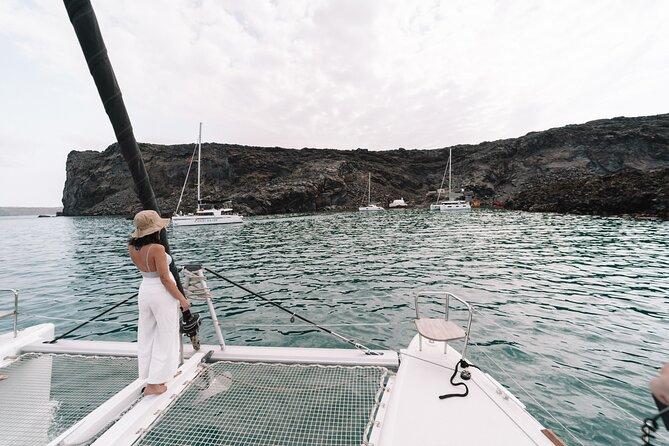 Half-Day Tailor-made Private Catamaran Cruise in Santorini - Onboard Food, Drinks, and Luxurious Comfort