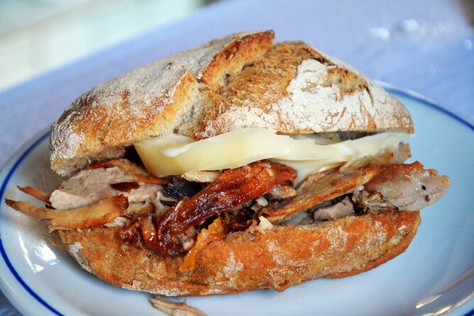 Half-Day Walking Tour Tasting Local Food in Porto - Visiting Sao Bento Railway Station’s Tile Collection