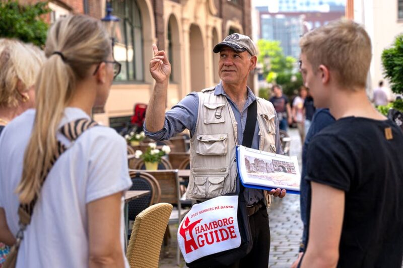 Hamburg: Guided Walking Tour in Danish - Exploring Speicherstadt: The Largest Warehouse District