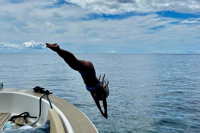 HD Private Boat Tour from Funchal  Swim, Paddle, Snorkel&Relax - Calhau da Lapa: Swimming in a Volcanic Paradise