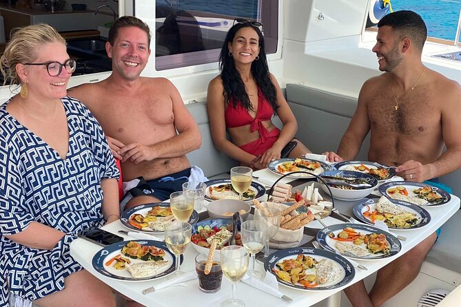 Heraklion: Dia Catamaran Tour, Lunch, Open Bar & Snorkeling - Water Activities and Playful Additions