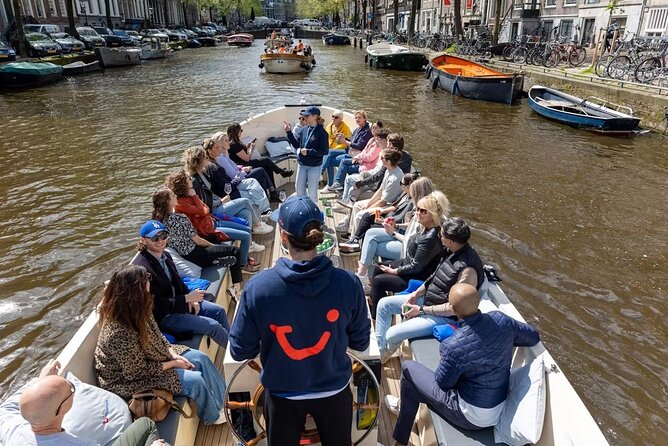 Highlights and Local Insights Canal Cruise Tour in Amsterdam - Practical Details and Onboard Experience