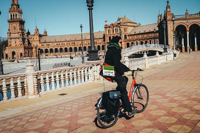 Highlights Electric Bike Tour - Admiring the Golden Tower and Postmodern Architecture
