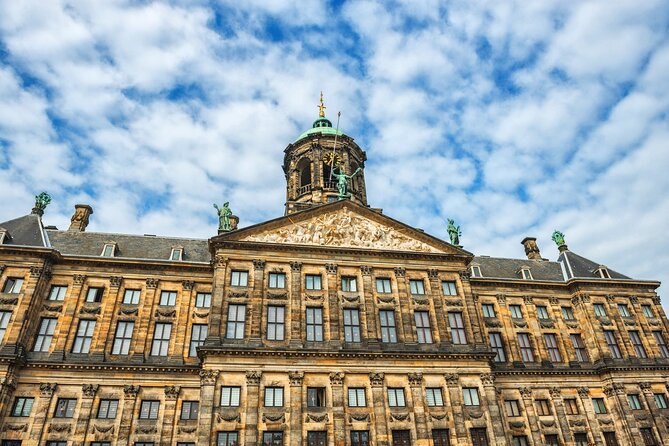 Historic Amsterdam Walking Tour: Royal Palace & Flea Markets - The Heart of Amsterdam at Dam Square