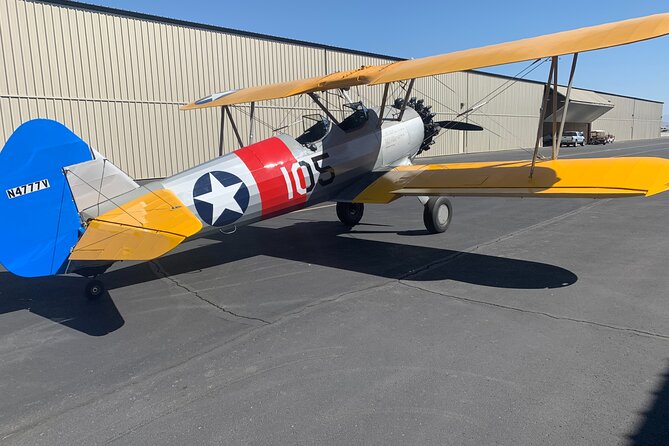 Historical Flight in an Open Cockpit Biplane from WWII - Weather and Cancellation Policies