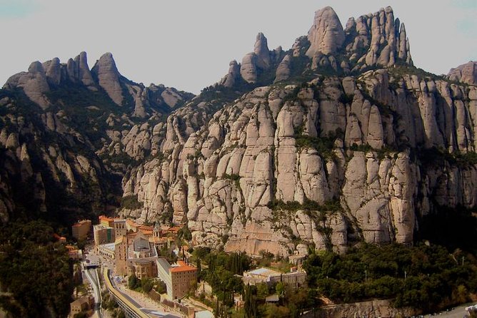Historical Montserrat Half-Day Hiking Tour from Barcelona - Practical Aspects: Group Size, Transport, and Flexibility