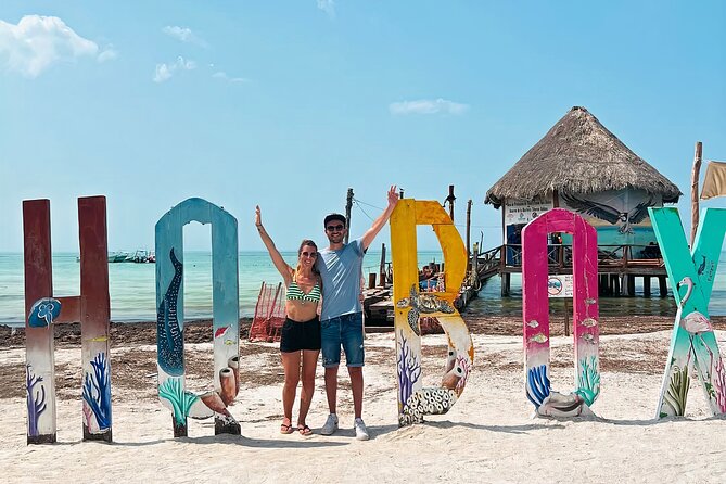 Holbox Island Trip with Boat Ride Biking and Swimming from Cancun - Key Points