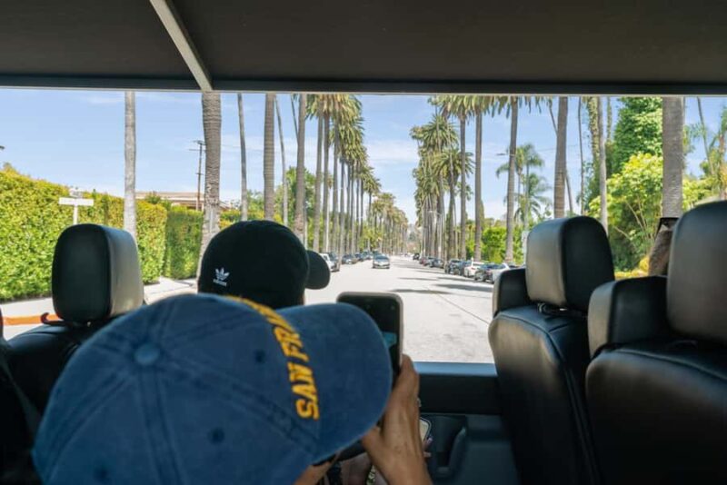 Hollywood, Beverly Hills & Celebrity Homes Open-Air Bus Tour - The Atmosphere and Guide Experience
