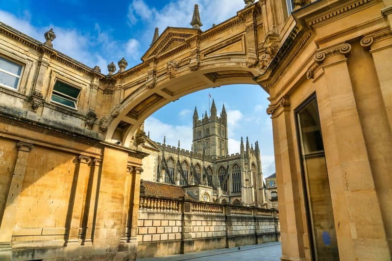 Hop on with Jane Austen in Bath : Bus and walking tour - Experience the Roman Baths from the Open-Top Bus