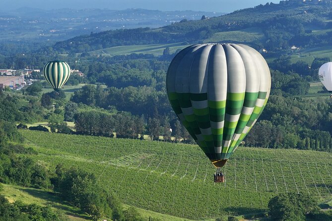 Hot air balloon over the hills of Pienza, Montalcino and Val D'Orcia - Who Will Love This Tuscany Hot Air Balloon Flight?