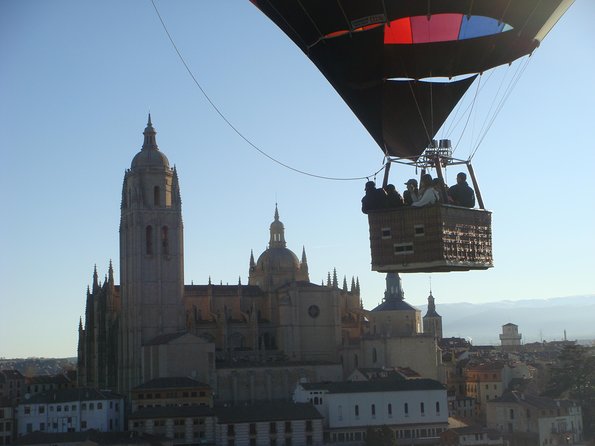 Hot-Air Balloon Ride over Segovia with Optional Transport from Madrid - Food, Drinks, and Celebrations on Landing