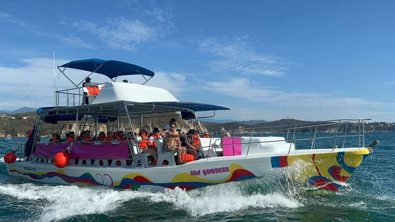 Huatulco: Bays Boat Tour with Snorkeling and Hotel Pickup - Scenic Boat Cruise across Huatulco’s Bays