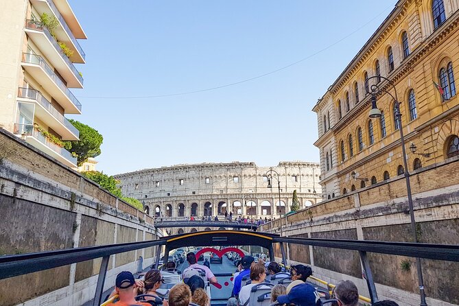 I Love Rome Hop on Hop off Open Bus Tour - Explore Rome at Your Own Pace on a Colorful Pink Double-Decker Bus